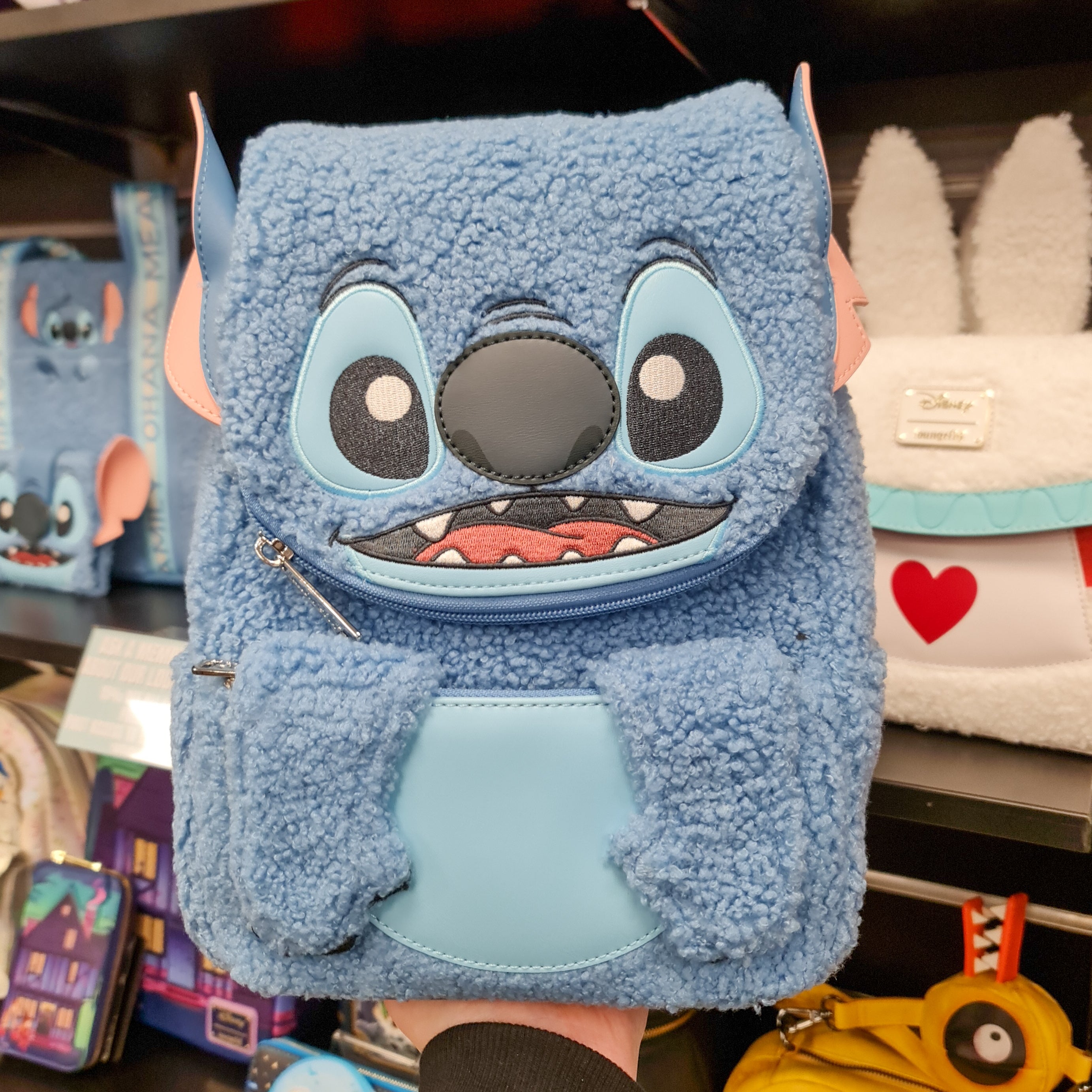 Stitch rolling outlet backpack