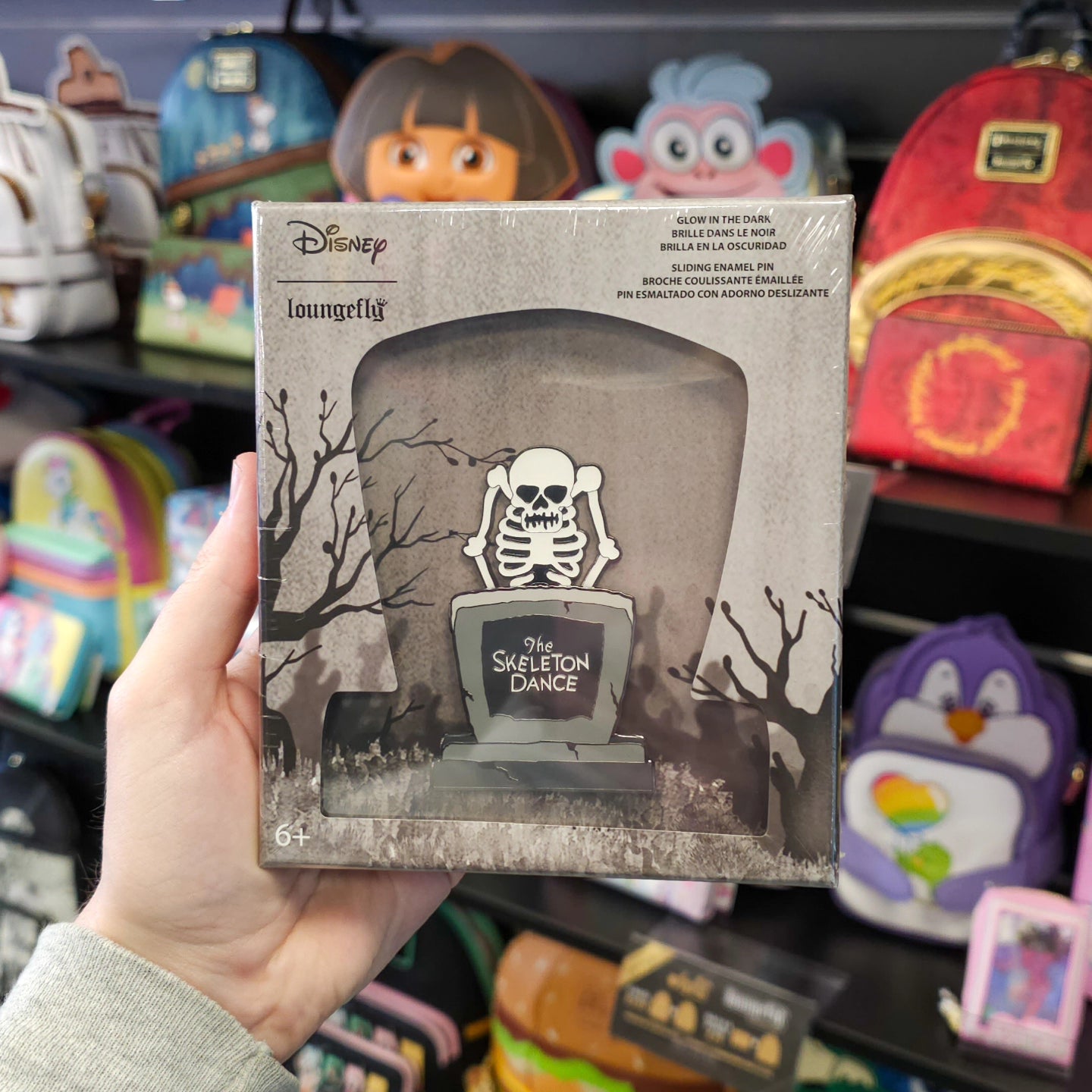 SKELETON DANCE GLOW IN THE DARK SLIDING 3" COLLECTOR BOX PIN
