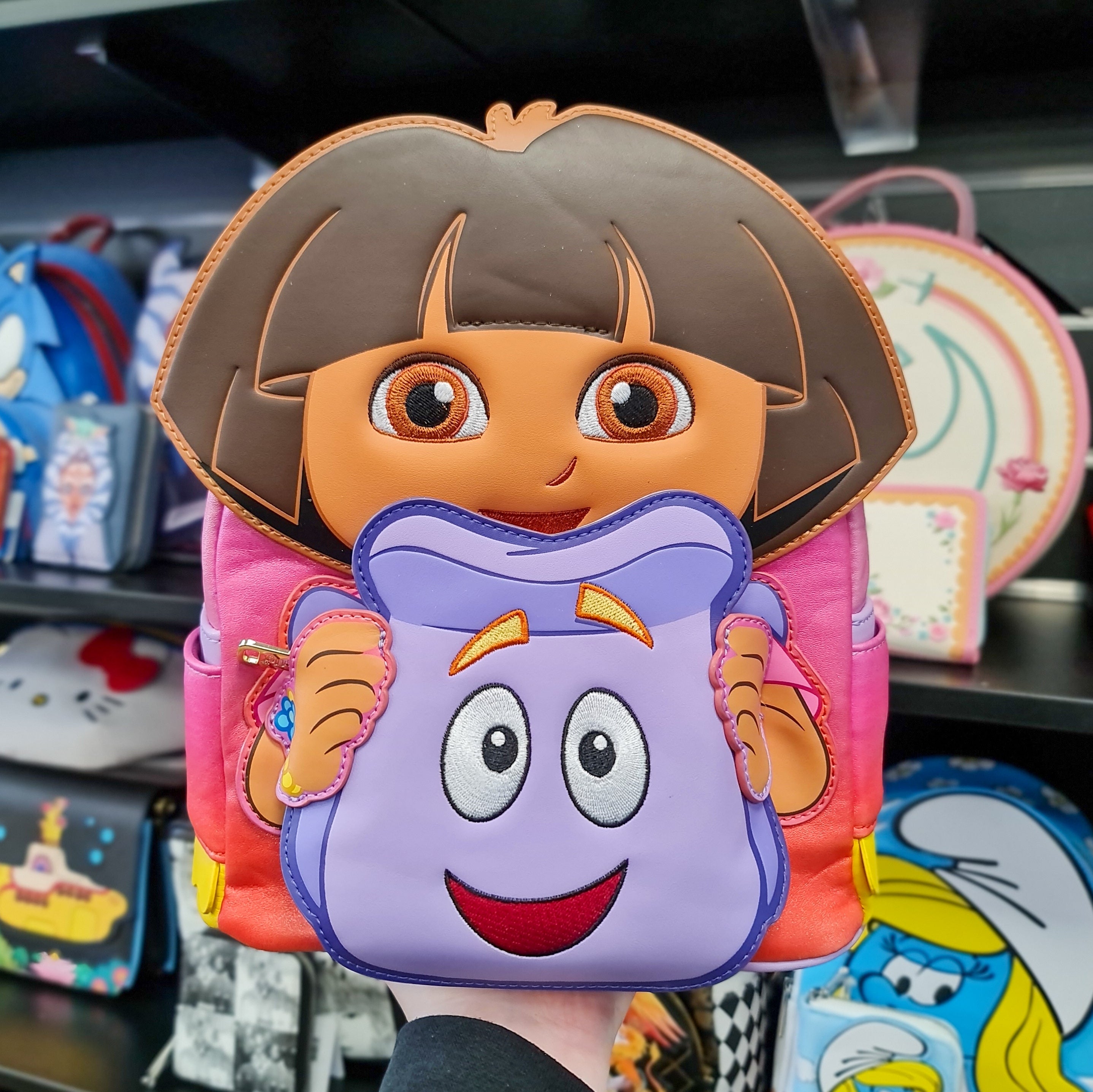 Dora and her backpack online